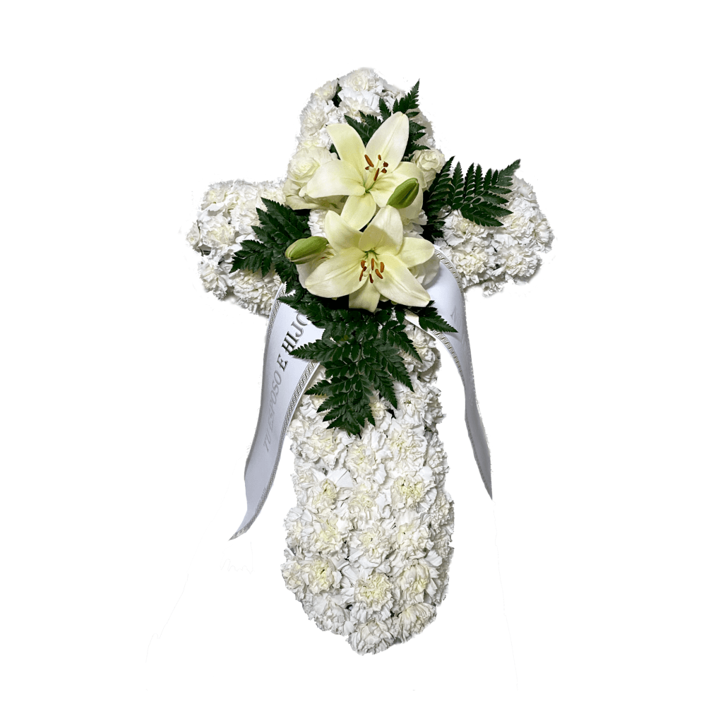cruz de flores para funeral, hecho con flores blancas y tonos de hojas verdes
